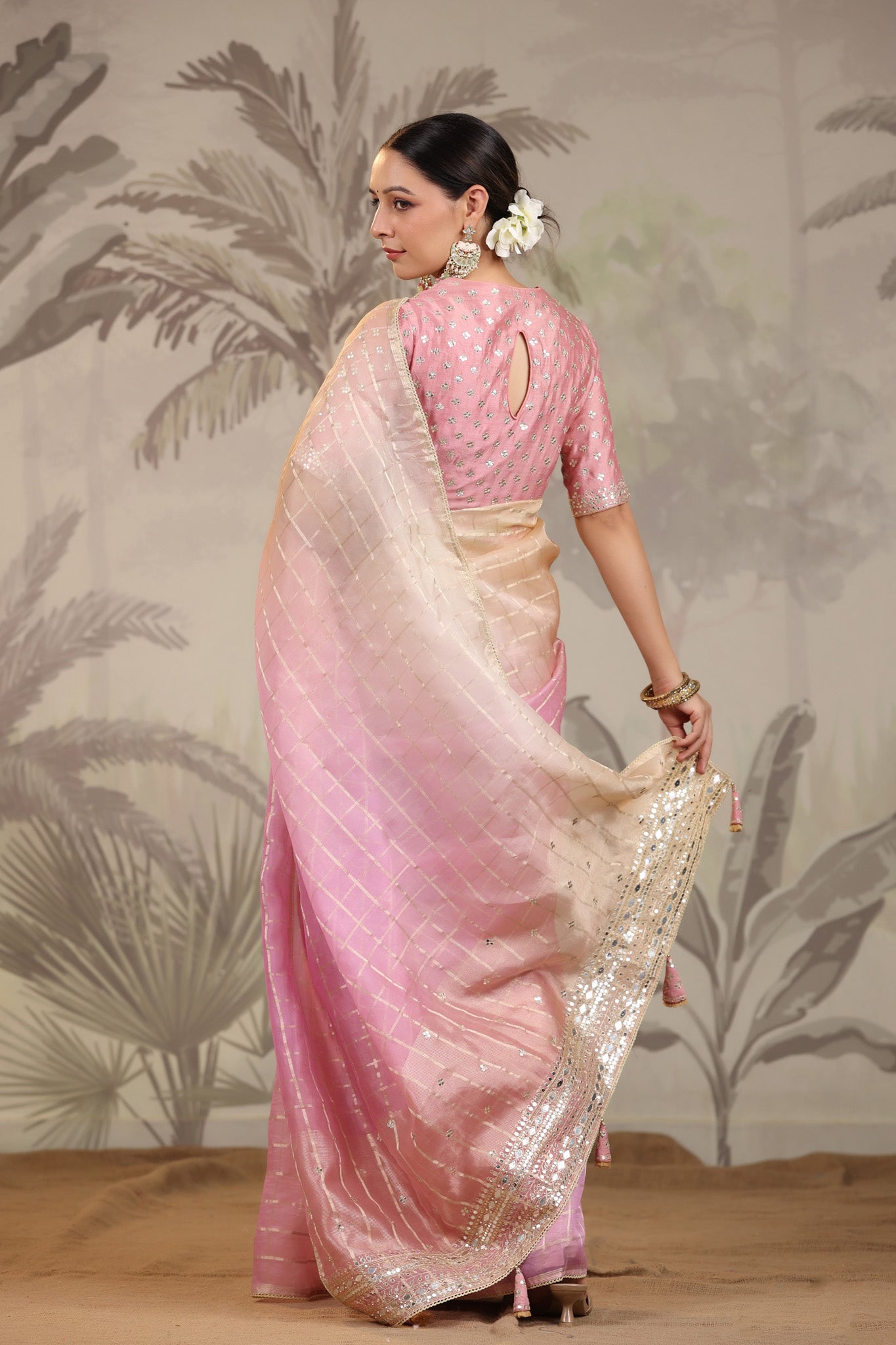 Shop stunning peach and pink embroidered tissue silk saree online in USA with embroidered blouse. Make a fashion statement on festive occasions and weddings with designer suits, Indian dresses, Anarkali suits, palazzo suits, designer sarees, sharara suits, Bollywood saris from Pure Elegance Indian fashion store in USA.-back