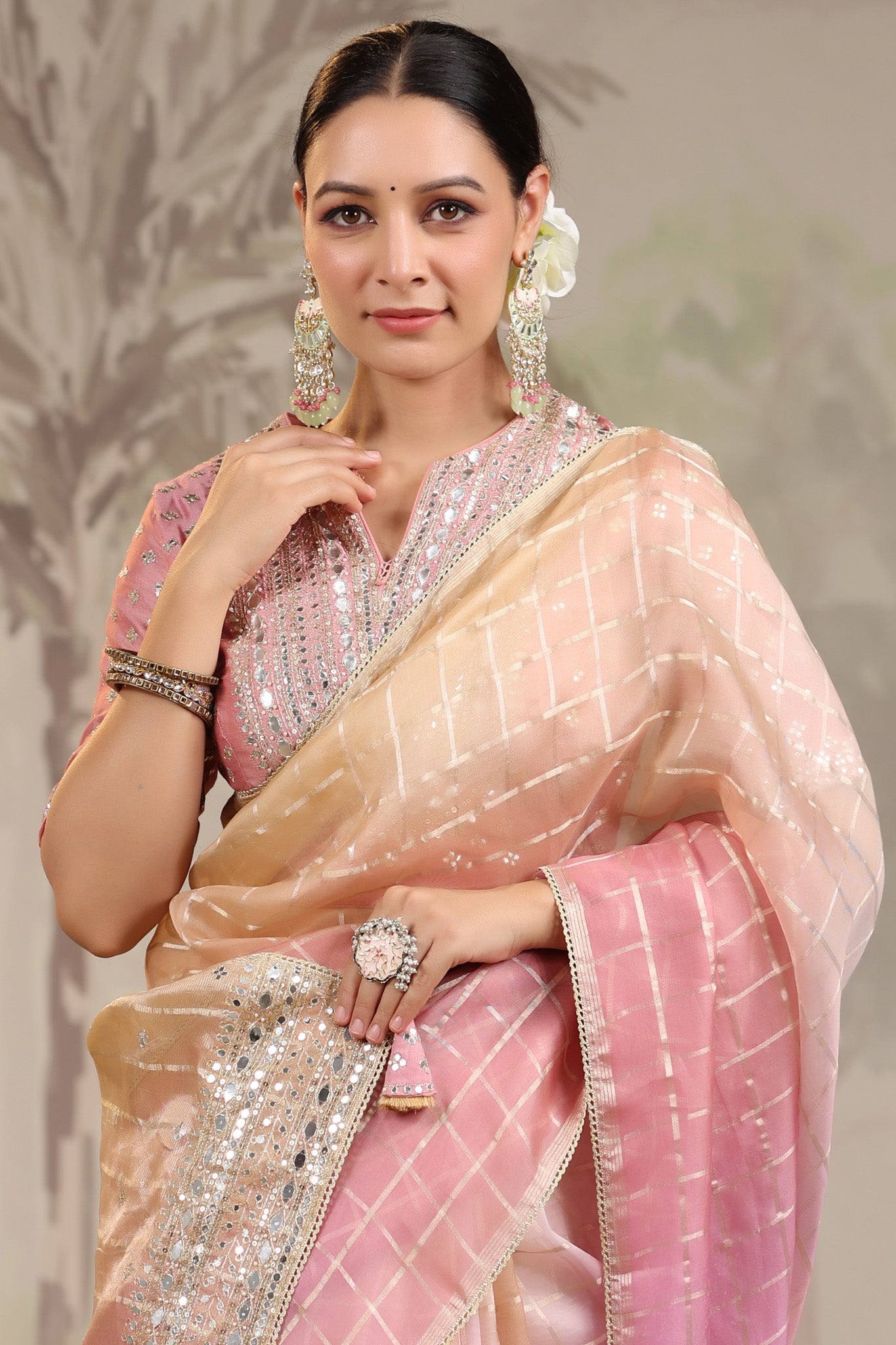Shop stunning peach and pink embroidered tissue silk saree online in USA with embroidered blouse. Make a fashion statement on festive occasions and weddings with designer suits, Indian dresses, Anarkali suits, palazzo suits, designer sarees, sharara suits, Bollywood saris from Pure Elegance Indian fashion store in USA.-closeup