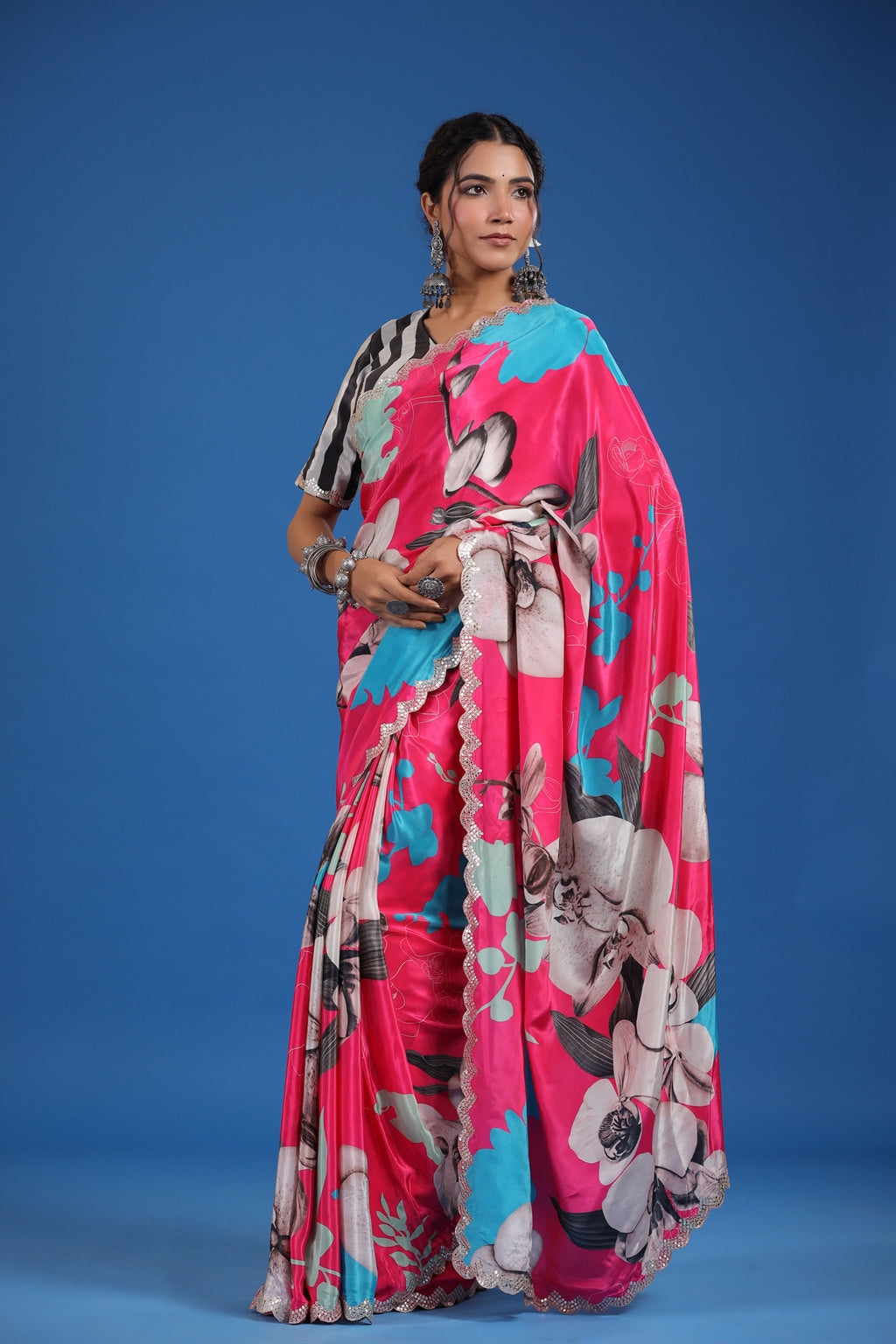Shop pink floral crepe georgette sari online in USA with saree blouse. Look classy at weddings and special occasions in exquisite designer sarees, embroidered sarees, party sarees, handwoven saris, pure silk sarees, Banarasi sarees, Kanjivaram sarees from Pure Elegance Indian saree store in USA.-full view