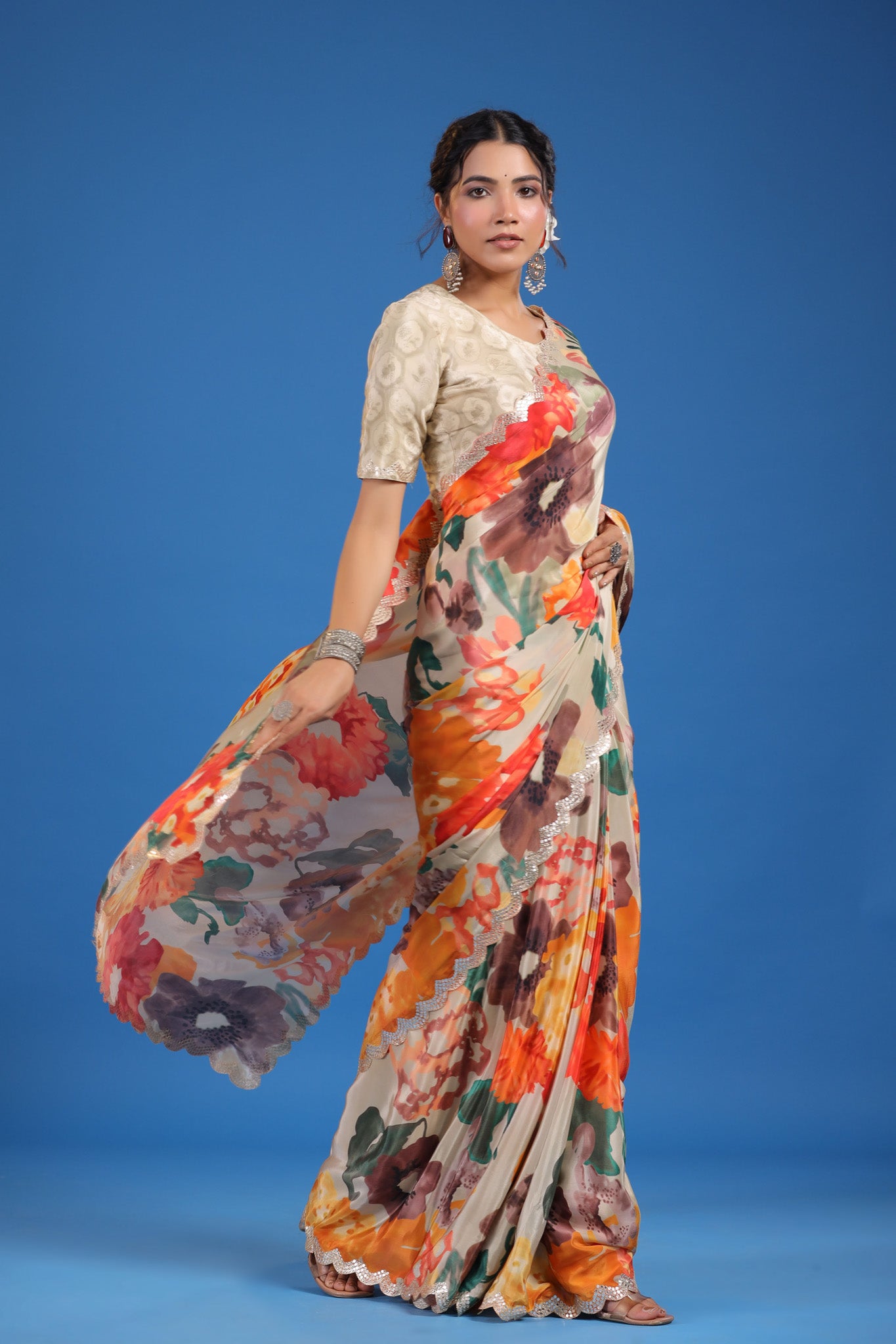 Shop beige floral crepe georgette saree online in USA with saree blouse. Look classy at weddings and special occasions in exquisite designer sarees, embroidered sarees, party sarees, handwoven saris, pure silk sarees, Banarasi sarees, Kanjivaram sarees from Pure Elegance Indian saree store in USA.-side