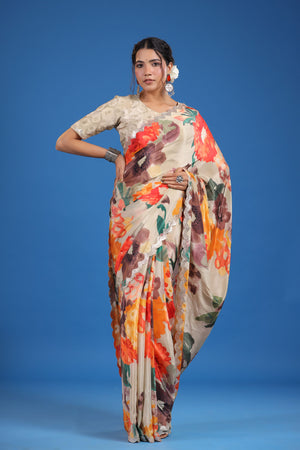 Shop beige floral crepe georgette saree online in USA with saree blouse. Look classy at weddings and special occasions in exquisite designer sarees, embroidered sarees, party sarees, handwoven saris, pure silk sarees, Banarasi sarees, Kanjivaram sarees from Pure Elegance Indian saree store in USA.-front