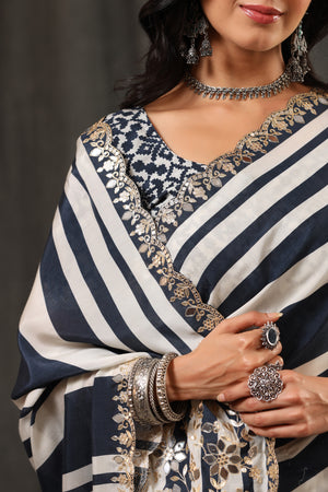 Buy stunning black and white stripes crepe georgette sari online in USA with saree blouse. Look classy at weddings and special occasions in exquisite designer sarees, embroidered sarees, party sarees, handwoven saris, pure silk sarees, Banarasi sarees, Kanjivaram sarees from Pure Elegance Indian saree store in USA.-closeup