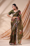 Shop olive green floral organza silk saree online in USA with embroidered scalloped border. Look classy at weddings and special occasions in exquisite designer sarees, embroidered sarees, party sarees, handwoven saris, pure silk sarees, Banarasi sarees, Kanjivaram sarees from Pure Elegance Indian saree store in USA.-full view