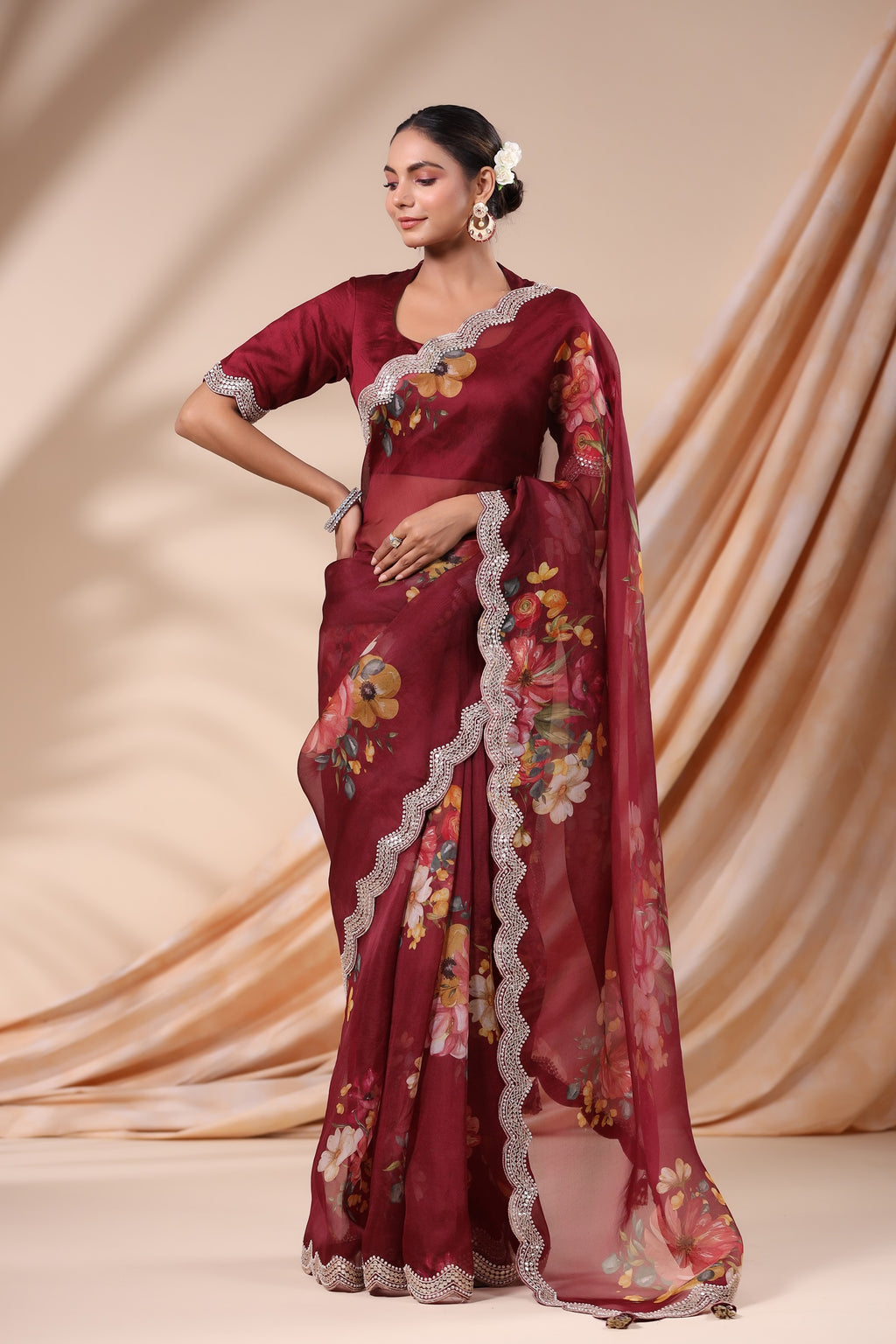 Buy maroon floral organza silk saree online in USA with embroidered scalloped border. Look classy at weddings and special occasions in exquisite designer sarees, embroidered sarees, party sarees, handwoven saris, pure silk sarees, Banarasi sarees, Kanjivaram sarees from Pure Elegance Indian saree store in USA.-full view