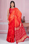Buy orange and red tie and dye gajji silk sari online in USA with zari pallu. Look your best on festive occasions in latest designer sarees, pure silk sarees, Kanjivaram silk saris, handwoven saris, tussar silk sarees, embroidered saris from Pure Elegance Indian clothing store in USA.-full view