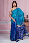 Shop blue tie and dye gajji silk sari online in USA with zari pallu. Look your best on festive occasions in latest designer sarees, pure silk sarees, Kanjivaram silk saris, handwoven saris, tussar silk sarees, embroidered saris from Pure Elegance Indian clothing store in USA.-full view