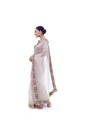 Buy silver embroidered organza saree online in USA with multicolor blouse. Look like a royalty in exquisite designer sarees, embroidered sarees, handwoven sarees, pure silk saris, Banarasi sarees, Kanjivaram sarees from Pure Elegance Indian saree store in USA.-side