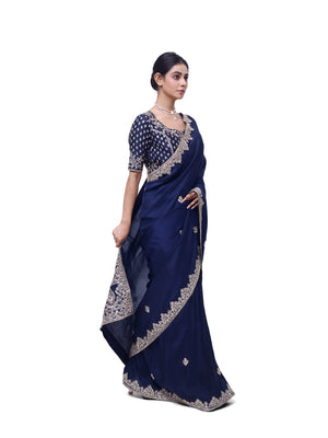 Buy navy blue embroidered zari silk saree online in USA with blouse. Look like a royalty in exquisite designer sarees, embroidered sarees, handwoven sarees, pure silk saris, Banarasi sarees, Kanjivaram sarees from Pure Elegance Indian saree store in USA.-side