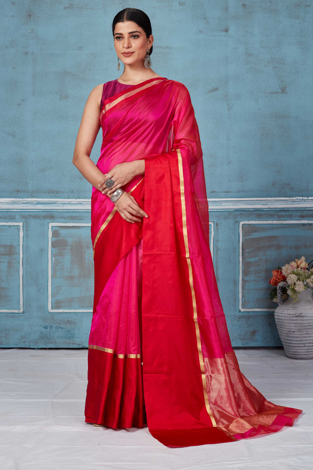 Shop beautiful solid pink Pattu silk saree online in USA with red Mashru border. Look your best on festive occasions in latest designer saris, pure silk saris, Kanchipuram silk sarees, handwoven sarees, tussar silk sarees, embroidered sarees from Pure Elegance Indian fashion store in USA.-full view