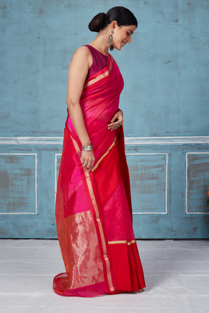 Shop beautiful solid pink Pattu silk saree online in USA with red Mashru border. Look your best on festive occasions in latest designer saris, pure silk saris, Kanchipuram silk sarees, handwoven sarees, tussar silk sarees, embroidered sarees from Pure Elegance Indian fashion store in USA.-side