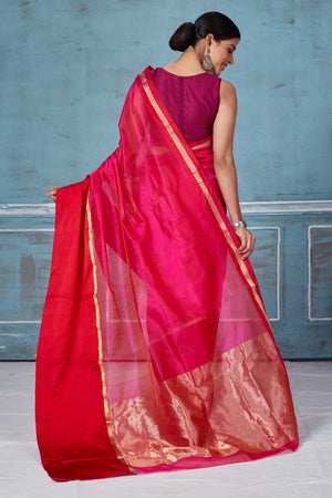Shop beautiful solid pink Pattu silk saree online in USA with red Mashru border. Look your best on festive occasions in latest designer saris, pure silk saris, Kanchipuram silk sarees, handwoven sarees, tussar silk sarees, embroidered sarees from Pure Elegance Indian fashion store in USA.-back