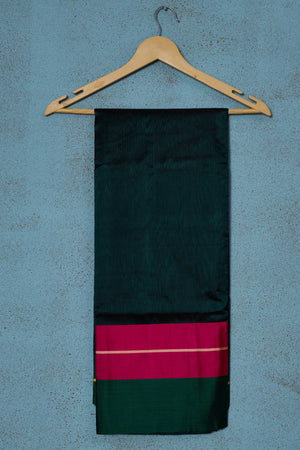 Buy dark green Pattu silk saree online in USA with pink Mashru border. Look your best on festive occasions in latest designer saris, pure silk saris, Kanchipuram silk sarees, handwoven sarees, tussar silk sarees, embroidered sarees from Pure Elegance Indian fashion store in USA.-saree