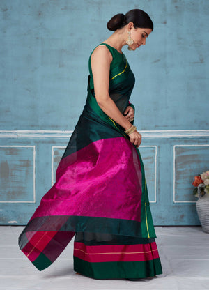 Buy dark green Pattu silk saree online in USA with pink Mashru border. Look your best on festive occasions in latest designer saris, pure silk saris, Kanchipuram silk sarees, handwoven sarees, tussar silk sarees, embroidered sarees from Pure Elegance Indian fashion store in USA.-side