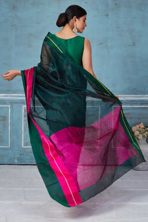 Buy dark green Pattu silk saree online in USA with pink Mashru border. Look your best on festive occasions in latest designer saris, pure silk saris, Kanchipuram silk sarees, handwoven sarees, tussar silk sarees, embroidered sarees from Pure Elegance Indian fashion store in USA.-back