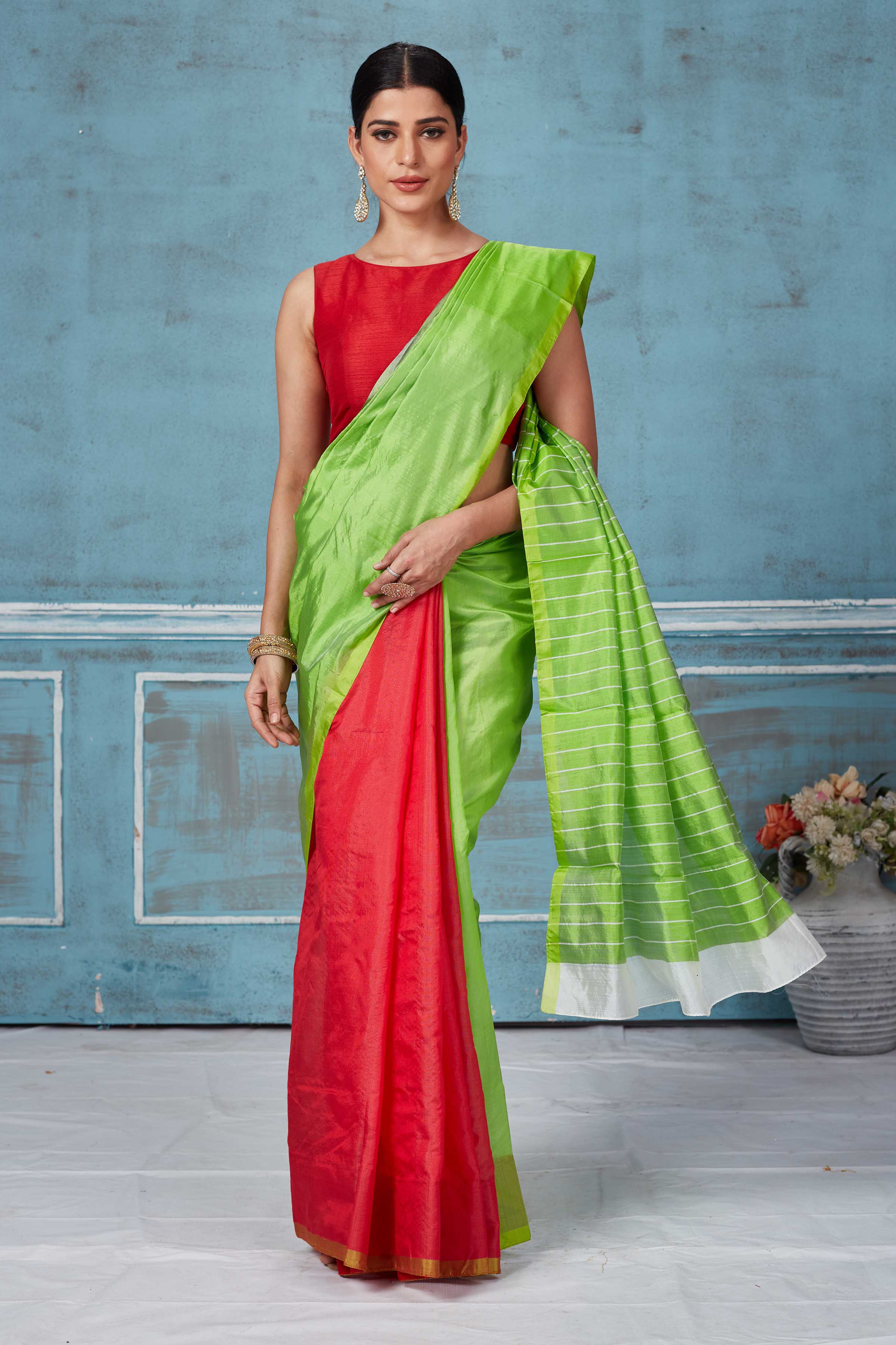 Buy green and red half and half Pattu silk saree online in USA. Look your best on festive occasions in latest designer saris, pure silk saris, Kanchipuram silk sarees, handwoven sarees, tussar silk sarees, embroidered sarees from Pure Elegance Indian fashion store in USA.-full view