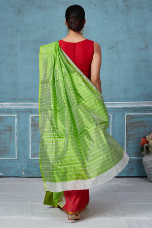 Buy green and red half and half Pattu silk saree online in USA. Look your best on festive occasions in latest designer saris, pure silk saris, Kanchipuram silk sarees, handwoven sarees, tussar silk sarees, embroidered sarees from Pure Elegance Indian fashion store in USA.-back