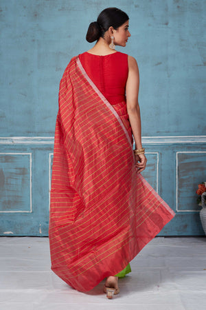 Buy red striped and green half and half Pattu silk saree online in USA. Look your best on festive occasions in latest designer saris, pure silk saris, Kanchipuram silk sarees, handwoven sarees, tussar silk sarees, embroidered sarees from Pure Elegance Indian fashion store in USA.-back