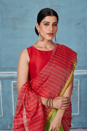 Buy red striped and green half and half Pattu silk saree online in USA. Look your best on festive occasions in latest designer saris, pure silk saris, Kanchipuram silk sarees, handwoven sarees, tussar silk sarees, embroidered sarees from Pure Elegance Indian fashion store in USA.-closeup
