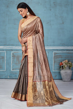 Shop beige striped Pattu silk saree online in USA with zari border. Look your best on festive occasions in latest designer saris, pure silk saris, Kanchipuram silk sarees, handwoven sarees, tussar silk sarees, embroidered sarees from Pure Elegance Indian fashion store in USA.-pallu