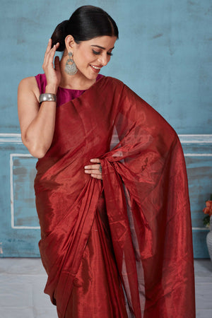Shop stunning maroon tissue silk golden zari saree online in USA. Look your best on festive occasions in latest designer saris, pure silk saris, Kanchipuram silk sarees, handwoven sarees, tussar silk sarees, embroidered sarees from Pure Elegance Indian fashion store in USA.-closeup