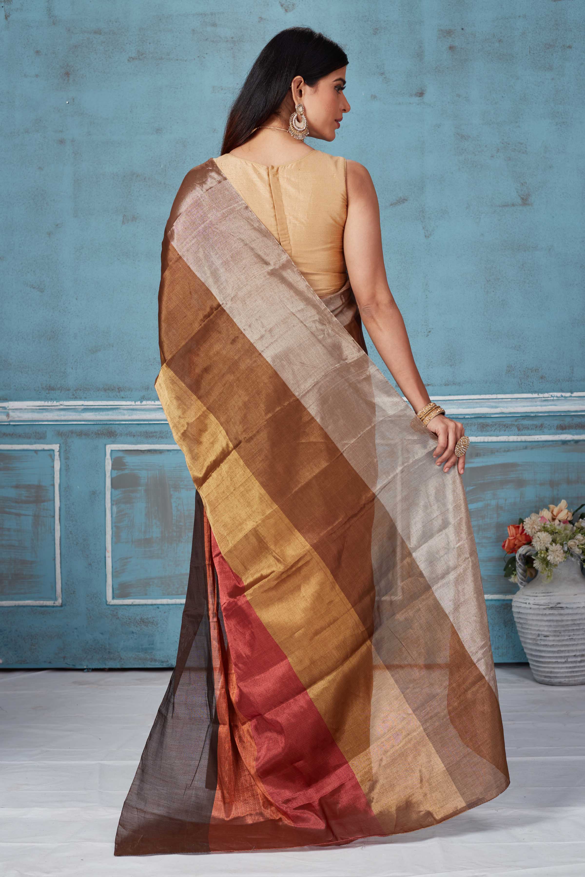 Shop beautiful brown multicolor tissue silk golden zari saree online in USA. Look your best on festive occasions in latest designer saris, pure silk saris, Kanchipuram silk sarees, handwoven sarees, tussar silk sarees, embroidered sarees from Pure Elegance Indian fashion store in USA.-back