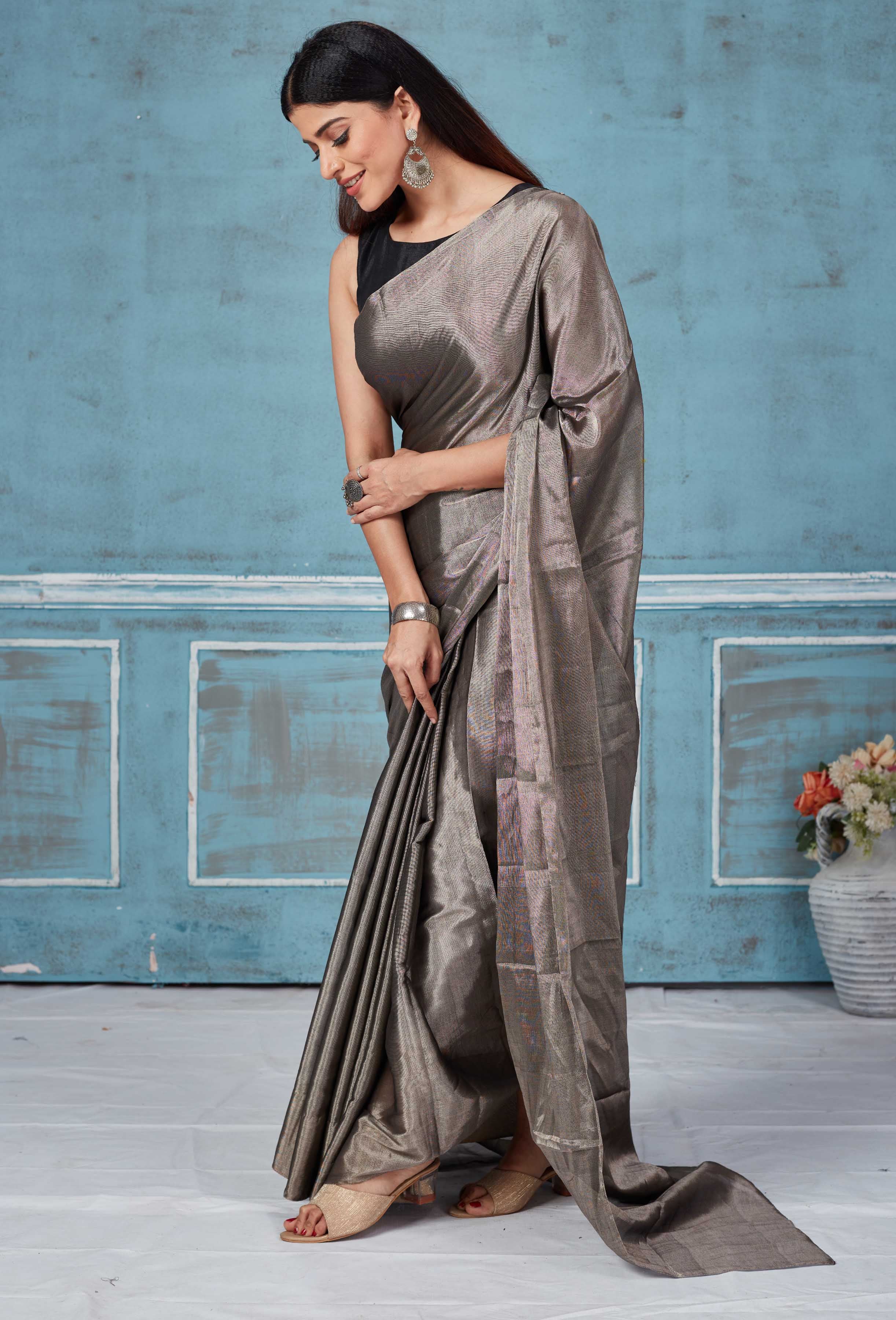 Shop stunning metallic grey tissue silk zari sari online in USA. Look your best on festive occasions in latest designer saris, pure silk saris, Kanchipuram silk sarees, handwoven sarees, tussar silk sarees, embroidered sarees from Pure Elegance Indian fashion store in USA.-pallu