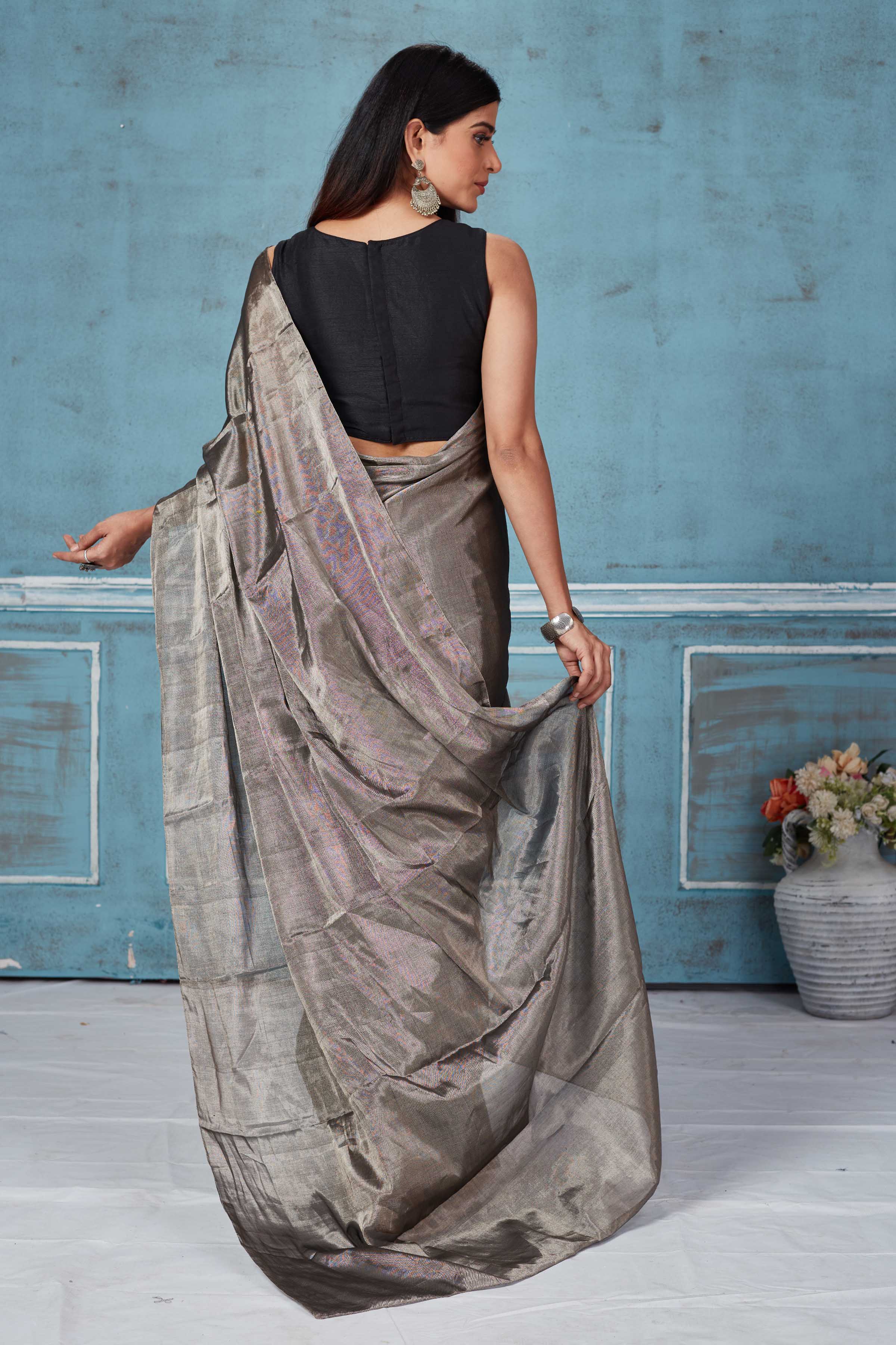 Shop stunning metallic grey tissue silk zari sari online in USA. Look your best on festive occasions in latest designer saris, pure silk saris, Kanchipuram silk sarees, handwoven sarees, tussar silk sarees, embroidered sarees from Pure Elegance Indian fashion store in USA.-back