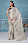 Shop stunning silver tissue silk zari sari online in USA. Look your best on festive occasions in latest designer saris, pure silk saris, Kanchipuram silk sarees, handwoven sarees, tussar silk sarees, embroidered sarees from Pure Elegance Indian fashion store in USA.-full view