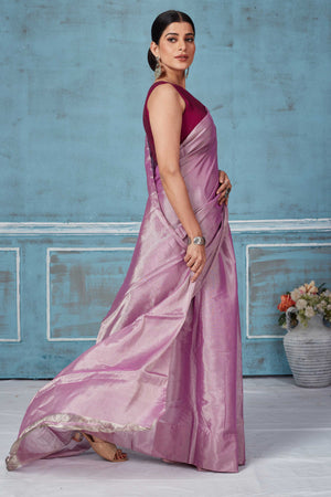 Buy stunning onion pink silver zari tissue silk sari online in USA. Look your best on festive occasions in latest designer saris, pure silk saris, Kanchipuram silk sarees, handwoven sarees, tussar silk sarees, embroidered sarees from Pure Elegance Indian fashion store in USA.-side