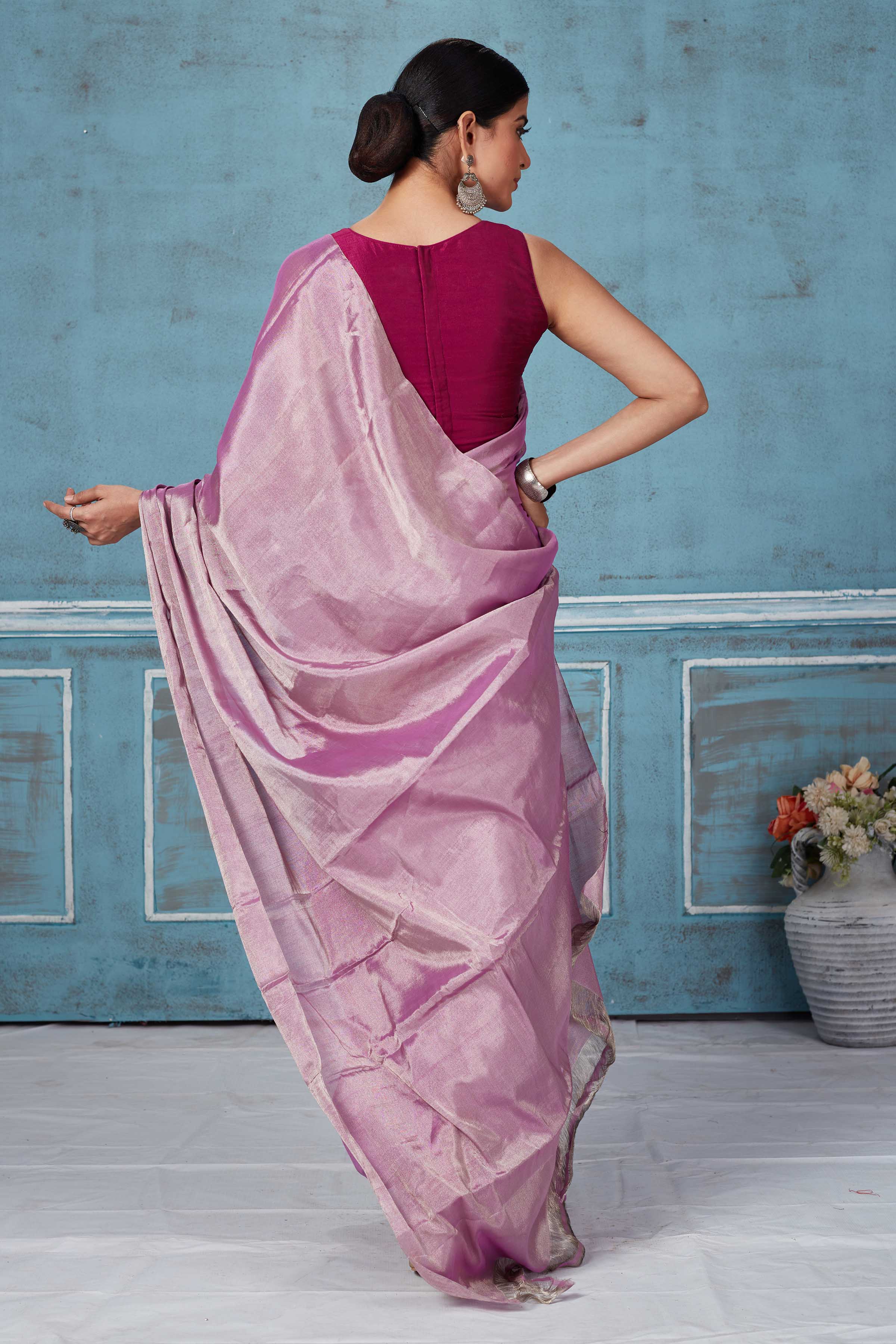 Buy stunning onion pink silver zari tissue silk sari online in USA. Look your best on festive occasions in latest designer saris, pure silk saris, Kanchipuram silk sarees, handwoven sarees, tussar silk sarees, embroidered sarees from Pure Elegance Indian fashion store in USA.-back