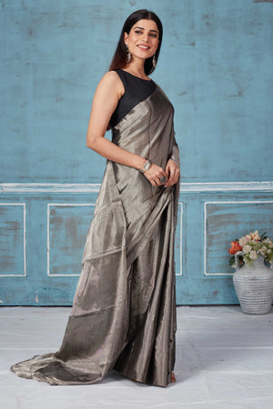 Shop stunning grey silver zari tissue silk sari online in USA. Look your best on festive occasions in latest designer saris, pure silk saris, Kanchipuram silk sarees, handwoven sarees, tussar silk sarees, embroidered sarees from Pure Elegance Indian fashion store in USA.-side