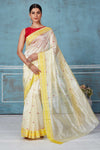 Shop beautiful cream Pattu silk sari online in USA with yellow border. Look your best on festive occasions in latest designer saris, pure silk saris, Kanchipuram silk sarees, handwoven sarees, tussar silk sarees, embroidered sarees from Pure Elegance Indian fashion store in USA.-full view