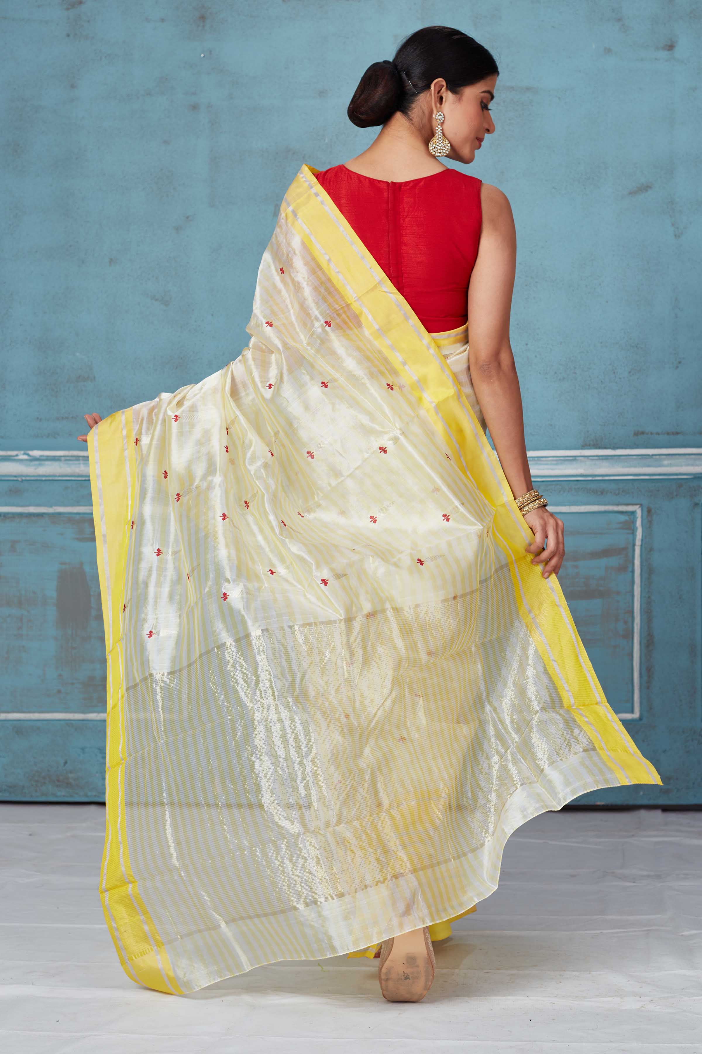 Shop beautiful cream Pattu silk sari online in USA with yellow border. Look your best on festive occasions in latest designer saris, pure silk saris, Kanchipuram silk sarees, handwoven sarees, tussar silk sarees, embroidered sarees from Pure Elegance Indian fashion store in USA.-back