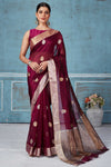 Buy wine color Pattu silk sari online in USA with silver zari motifs. Look your best on festive occasions in latest designer saris, pure silk saris, Kanchipuram silk sarees, handwoven sarees, tussar silk sarees, embroidered sarees from Pure Elegance Indian fashion store in USA.-full view