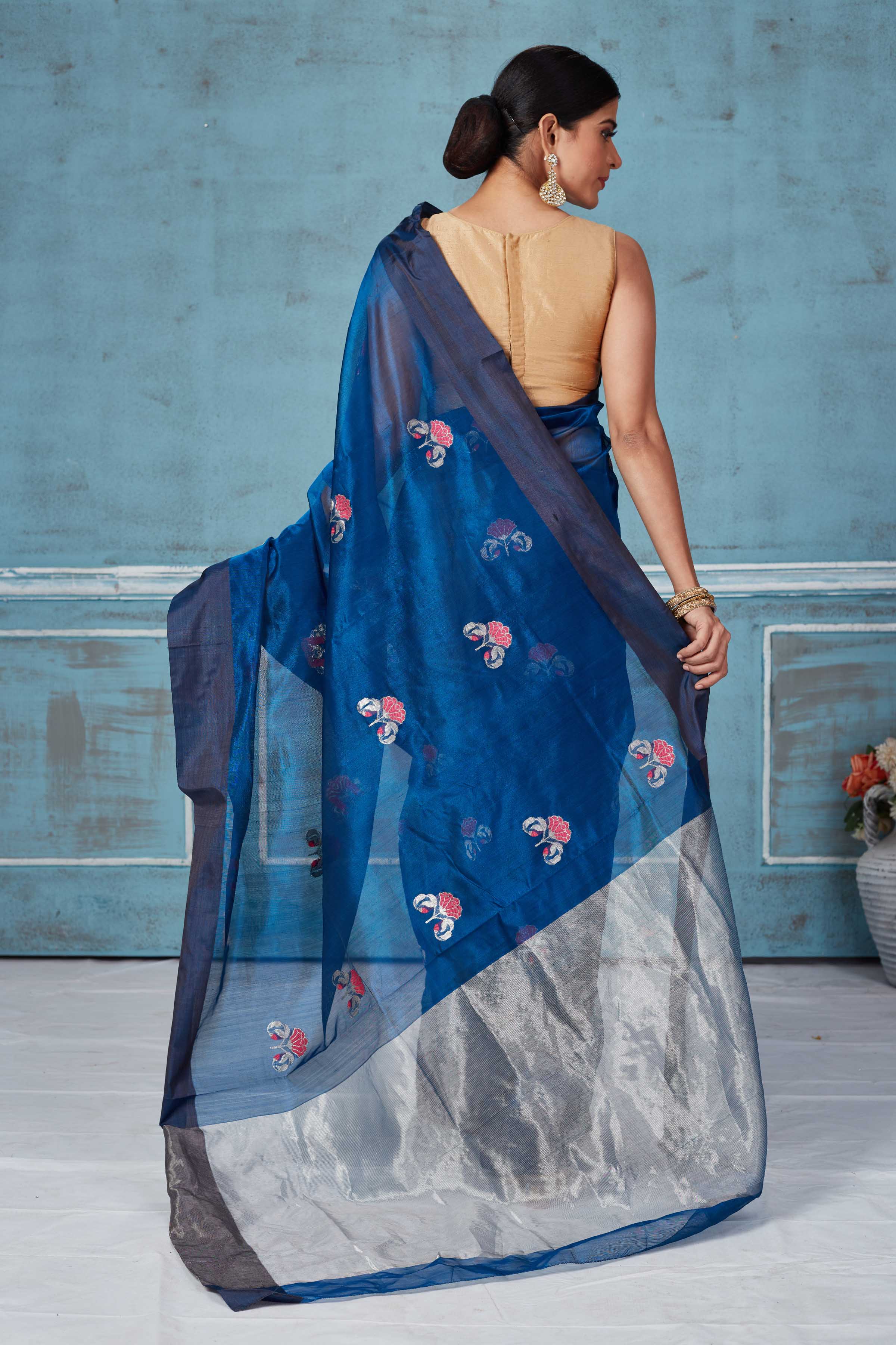 Shop blue Pattu silk sari online in USA with floral zari motifs. Look your best on festive occasions in latest designer saris, pure silk saris, Kanchipuram silk sarees, handwoven sarees, tussar silk sarees, embroidered sarees from Pure Elegance Indian fashion store in USA.-back