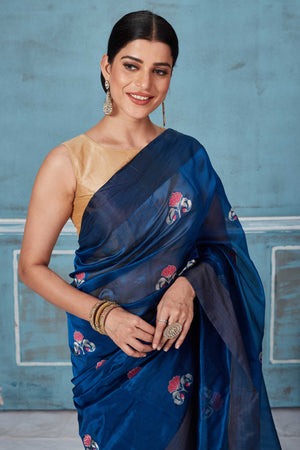 Shop blue Pattu silk sari online in USA with floral zari motifs. Look your best on festive occasions in latest designer saris, pure silk saris, Kanchipuram silk sarees, handwoven sarees, tussar silk sarees, embroidered sarees from Pure Elegance Indian fashion store in USA.-closeup