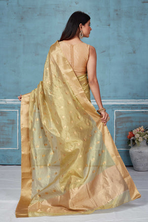 Buy golden Pattu silk sari online in USA with nakshi border. Look your best on festive occasions in latest designer saris, pure silk saris, Kanchipuram silk sarees, handwoven sarees, tussar silk sarees, embroidered sarees from Pure Elegance Indian fashion store in USA.-back