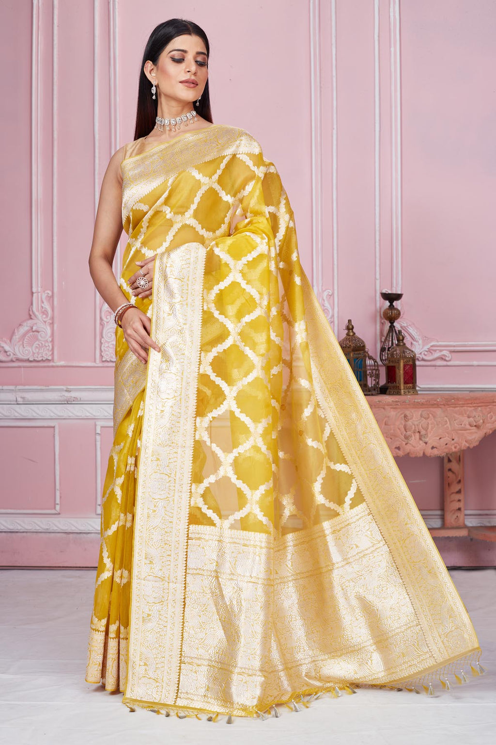 Shop beautiful yellow and orange Banarasi saree online in USA with zari jaal. Look your best on festive occasions in latest designer saris, pure silk sarees, Kanjivaram silk sarees, handwoven saris, tussar silk sarees, embroidered saris from Pure Elegance Indian fashion store in USA.-full view