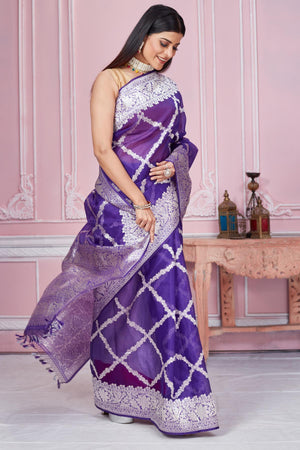 Shop beautiful purple Banarasi saree online in USA with silver zari work. Look your best on festive occasions in latest designer saris, pure silk sarees, Kanjivaram silk sarees, handwoven saris, tussar silk sarees, embroidered saris from Pure Elegance Indian fashion store in USA.-side
