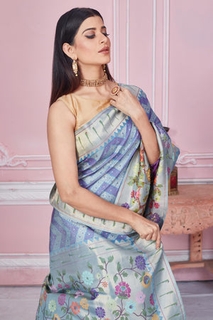 Shop blue and purple Banarasi saree online in USA with minakari zari pallu. Look your best on festive occasions in latest designer saris, pure silk sarees, Kanjivaram silk sarees, handwoven saris, tussar silk sarees, embroidered saris from Pure Elegance Indian fashion store in USA.-closeup