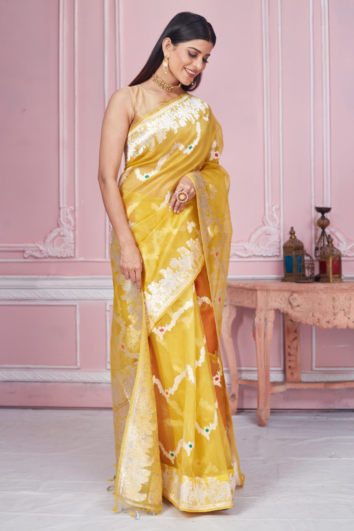 Shop yellow Banarasi saree online in USA with zari minakari work. Look your best on festive occasions in latest designer saris, pure silk sarees, Kanjivaram silk sarees, handwoven saris, tussar silk sarees, embroidered saris from Pure Elegance Indian fashion store in USA.-side