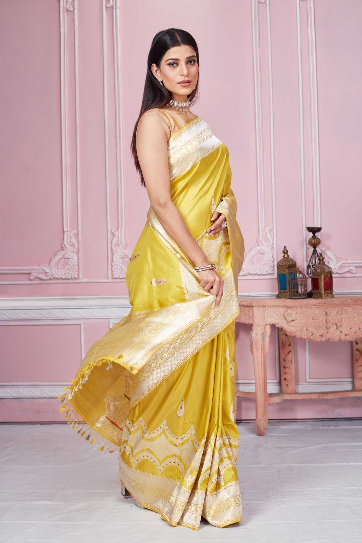 Shop yellow Banarasi sari online in USA with zari minakari buta. Look your best on festive occasions in latest designer saris, pure silk sarees, Kanjivaram silk sarees, handwoven saris, tussar silk sarees, embroidered saris from Pure Elegance Indian fashion store in USA.-side