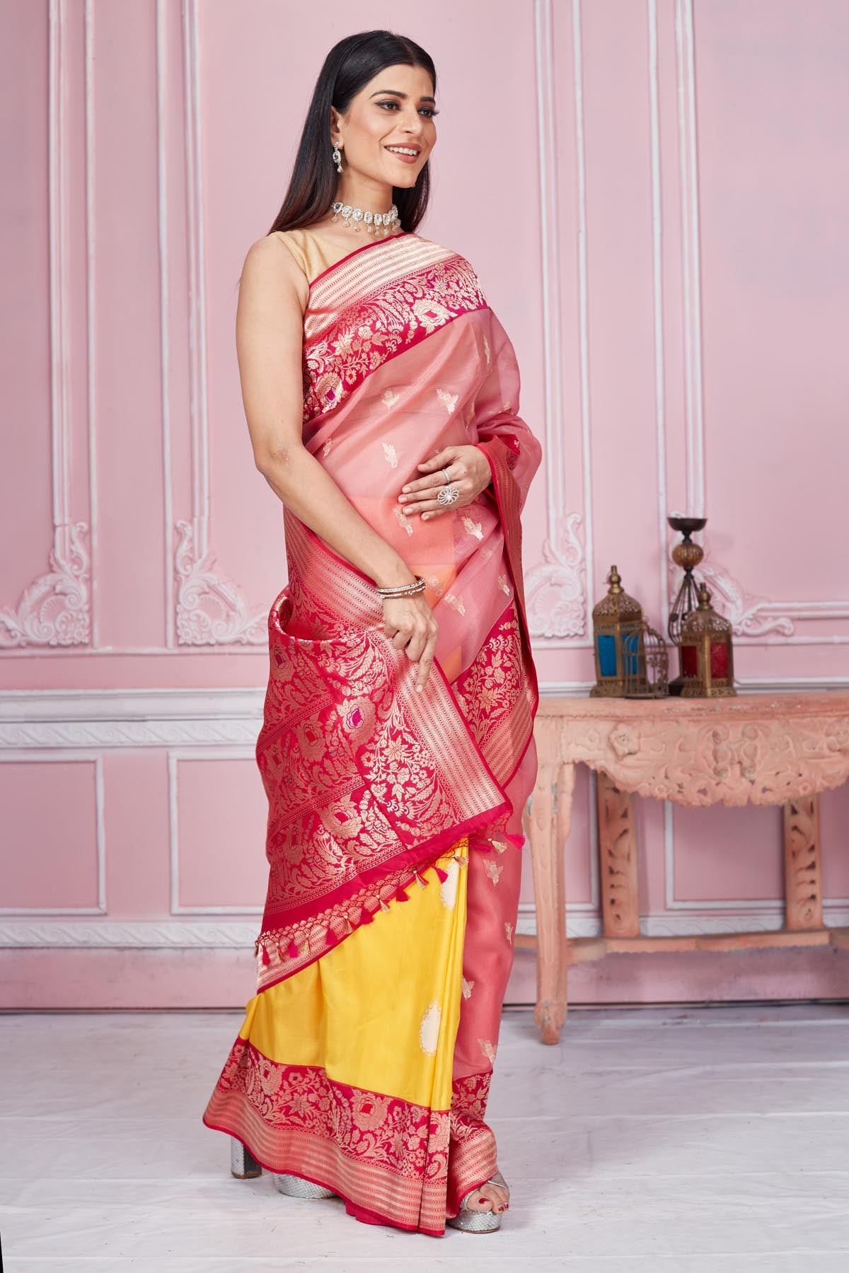 Buy pink and yellow Banarasi sari online in USA with zari minakari border. Look your best on festive occasions in latest designer saris, pure silk sarees, Kanjivaram silk sarees, handwoven saris, tussar silk sarees, embroidered saris from Pure Elegance Indian fashion store in USA.-side