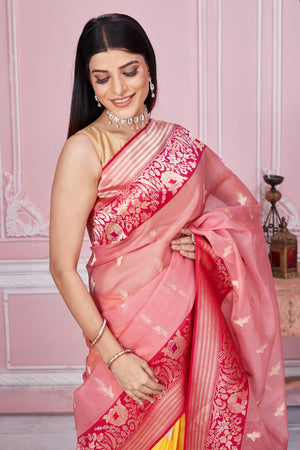 Buy pink and yellow Banarasi sari online in USA with zari minakari border. Look your best on festive occasions in latest designer saris, pure silk sarees, Kanjivaram silk sarees, handwoven saris, tussar silk sarees, embroidered saris from Pure Elegance Indian fashion store in USA.-closeup