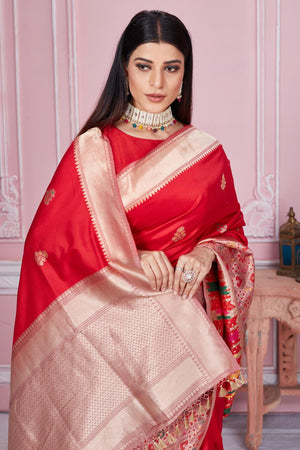 Shop red Banarasi sari online in USA with heavy zari pallu. Look your best on festive occasions in latest designer saris, pure silk sarees, Kanjivaram silk sarees, handwoven saris, tussar silk sarees, embroidered saris from Pure Elegance Indian fashion store in USA.=closeup