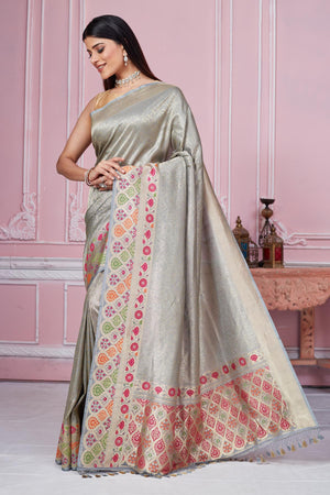 Buy grey Banarasi sari online in USA with zari minakari border. Look your best on festive occasions in latest designer saris, pure silk sarees, Kanjivaram silk sarees, handwoven saris, tussar silk sarees, embroidered saris from Pure Elegance Indian fashion store in USA.-pallu
