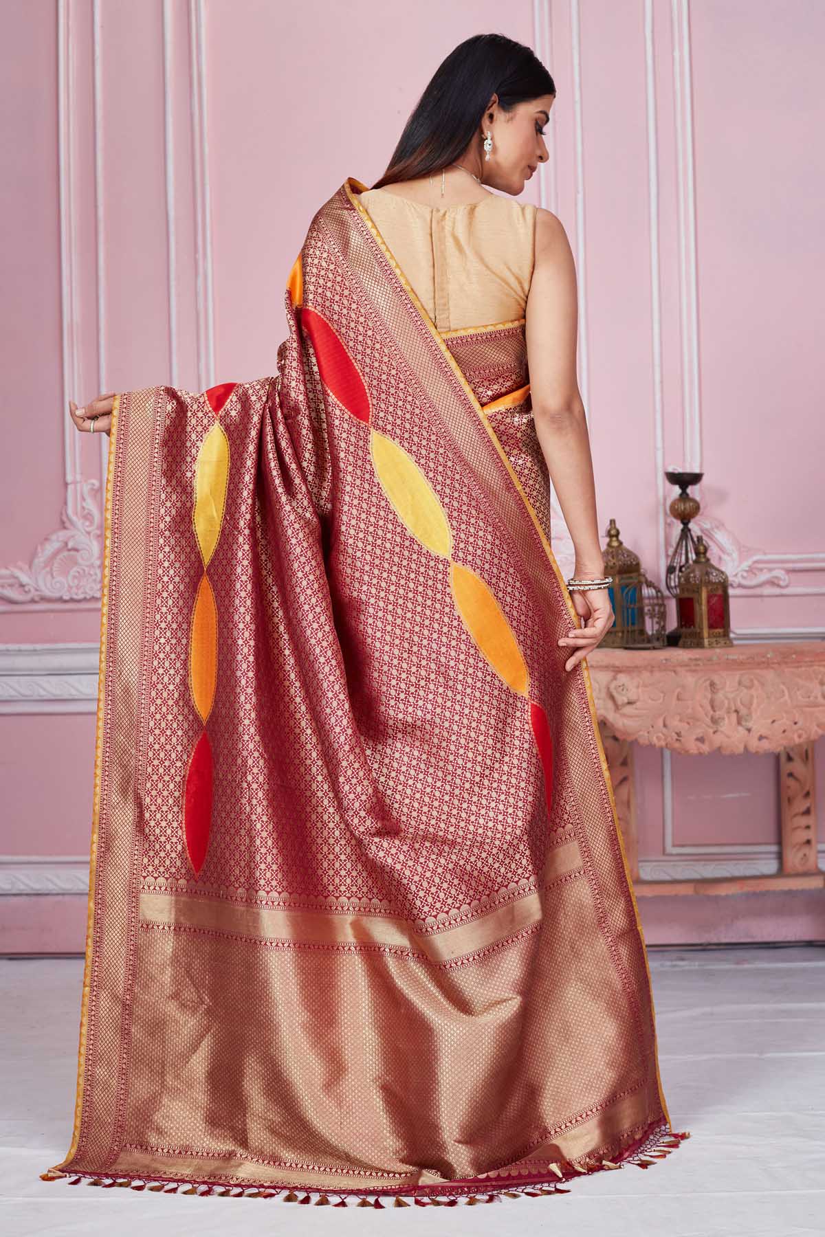 Buy beautiful maroon heavy zari Banarasi sari online in USA. Look your best on festive occasions in latest designer saris, pure silk sarees, Kanjivaram silk sarees, handwoven saris, tussar silk sarees, embroidered saris from Pure Elegance Indian fashion store in USA.-back