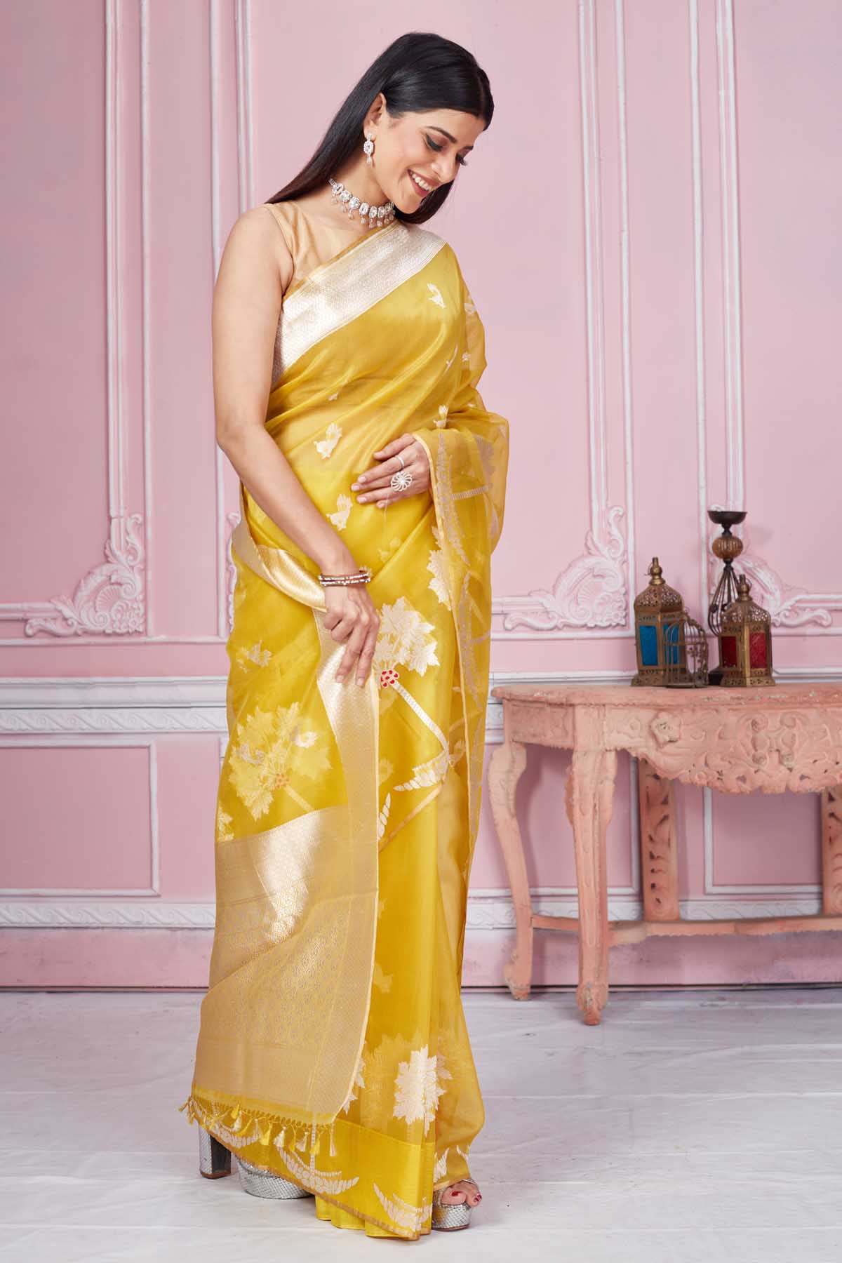 Buy beautiful yellow Banarasi sari online in USA with golden zari border and pallu. Look your best on festive occasions in latest designer saris, pure silk sarees, Kanjivaram silk sarees, handwoven saris, tussar silk sarees, embroidered saris from Pure Elegance Indian fashion store in USA.-side