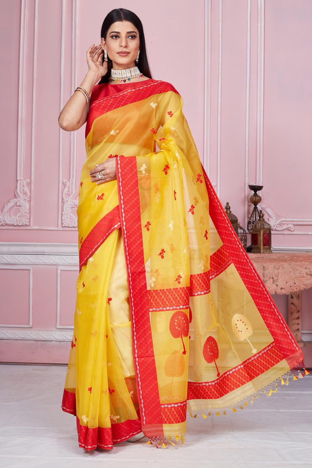 Shop yellow Banarasi sari online in USA with scattered red buti. Look your best on festive occasions in latest designer saris, pure silk sarees, Kanjivaram silk sarees, handwoven saris, tussar silk sarees, embroidered saris from Pure Elegance Indian fashion store in USA.-full view