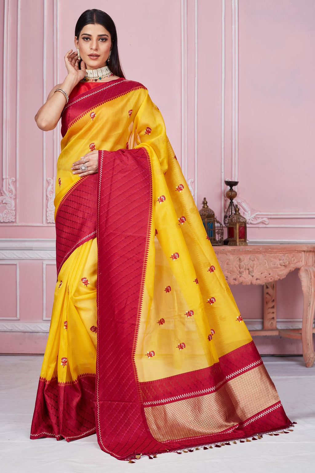 Buy yellow Banarasi saree online in USA with red border and zari pallu. Look your best on festive occasions in latest designer saris, pure silk sarees, Kanjivaram silk sarees, handwoven saris, tussar silk sarees, embroidered saris from Pure Elegance Indian fashion store in USA.-full view